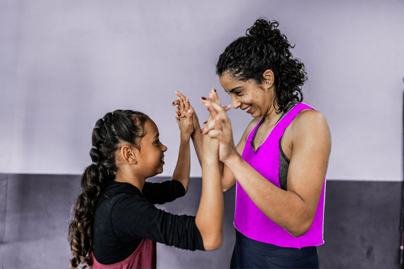 Lady and Child hands together